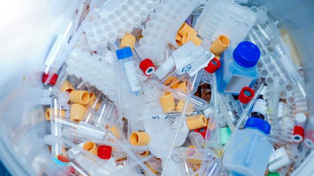 A bin full of plastic laboratory waste 