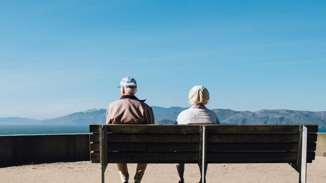 An elderly man and woman.  