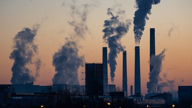 Smoke coming from factory chimneys. 